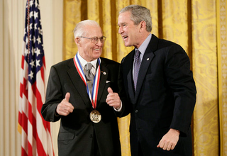 Former president George W. Bush presents a National Medal of Science in 2006 to Norman Borlaug for his work in creating disease resistant and high-yield wheat, providing a new quality food source for millions of people around the world. Image: White House photo by Eric Draper